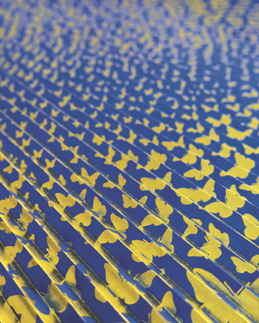 Close-up of the folded strips of a butterfly work