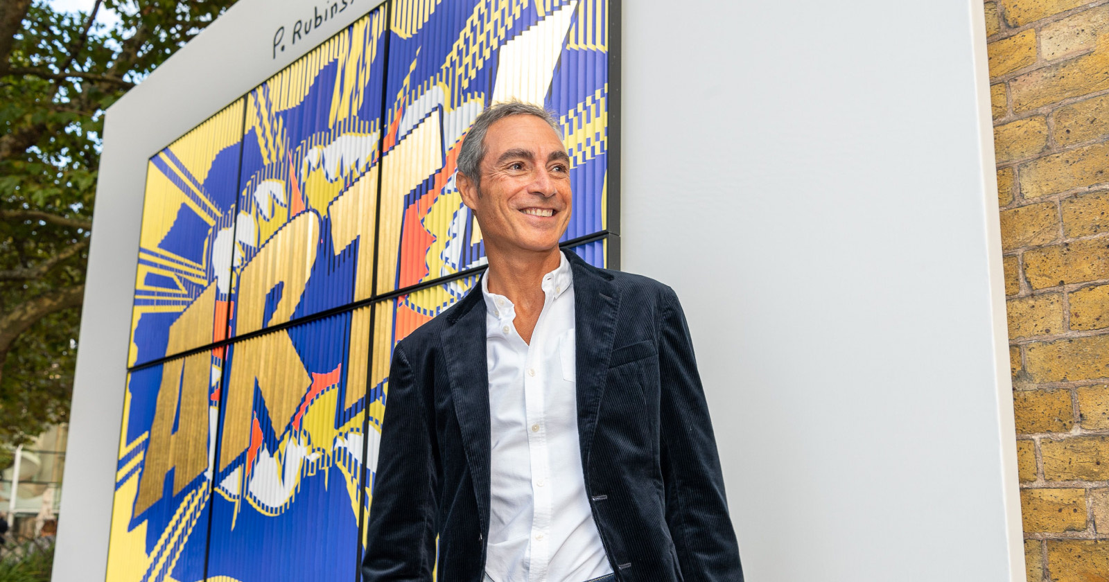Patrick Rubinstein in front of a monumental work